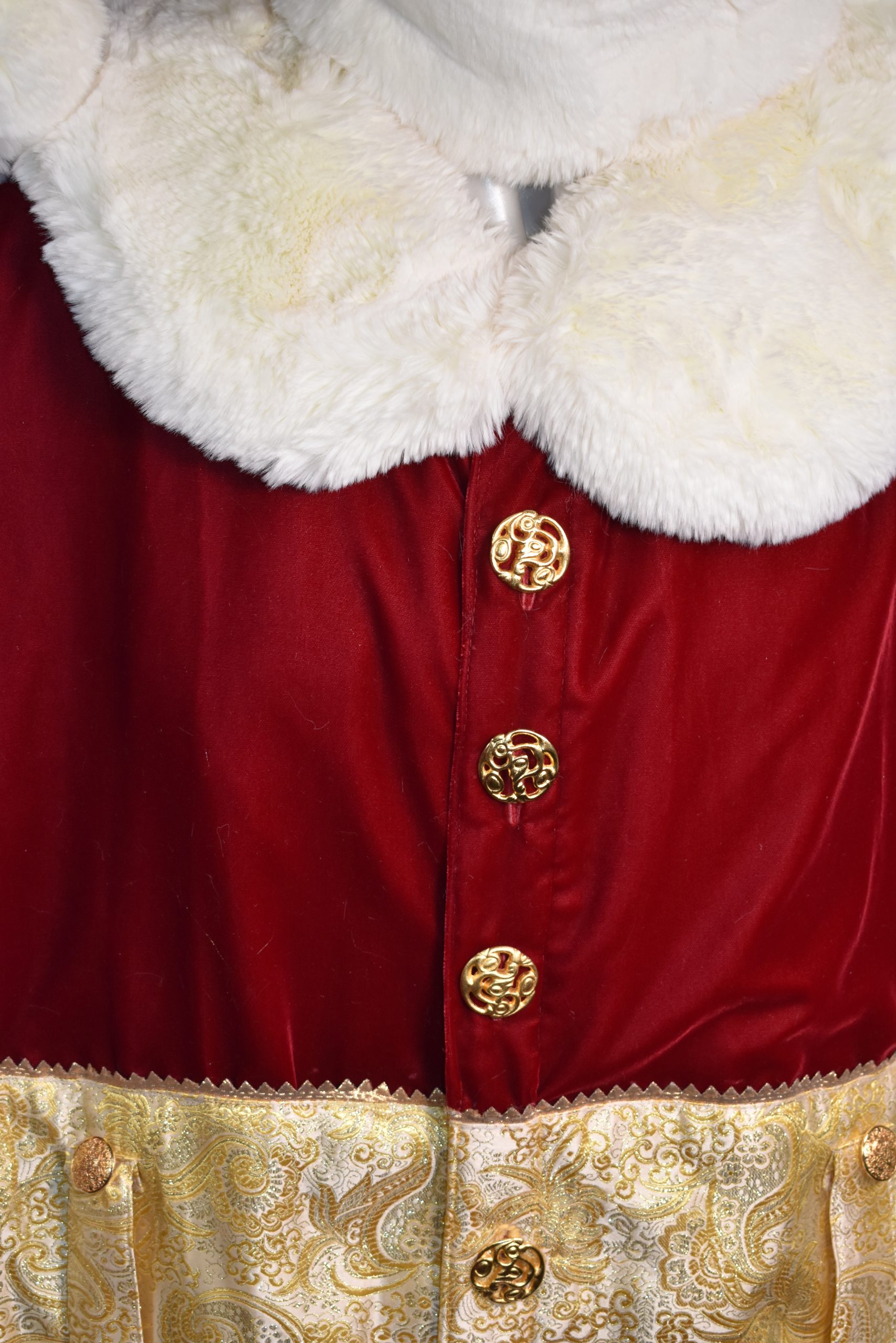 Xmas red velvet suit with a flared front is piped with a gold panel down  the front to highlight the buttons is done in polar bear fur. - Pro Santa  Shop